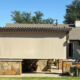 Pergola with exterior cable guided shades in Alpaca color blocking 95% of sun