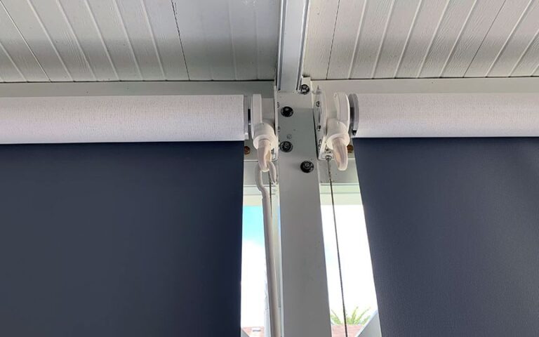 Crank operated, exposed roll